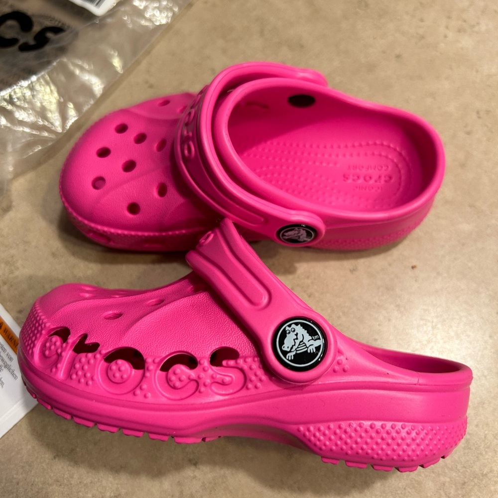 Brand new with tags toddler pink size 8 crocs.